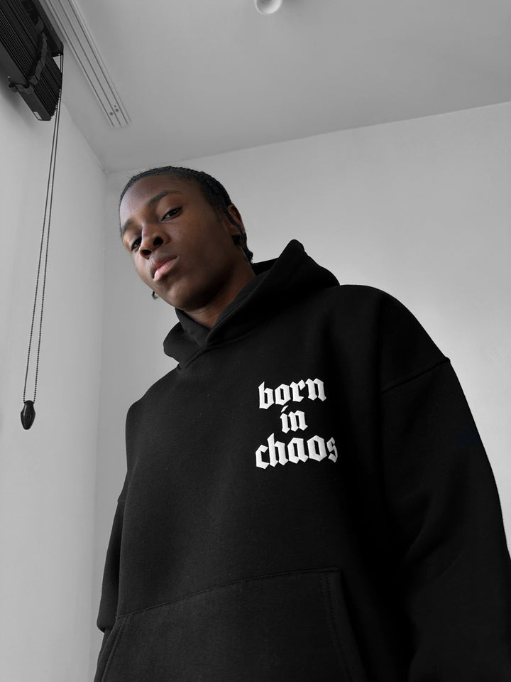 Oversize “Born in Chaos” Hoodie - Black